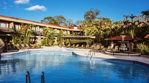 Outdoor pool, pool umbrellas, sun loungers
