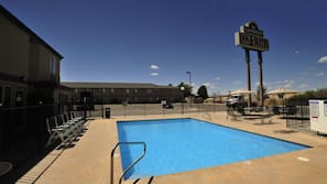 Seasonal outdoor pool, open 10 AM to 10 PM, pool umbrellas, sun loungers