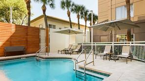 Outdoor pool, open 6:00 AM to 11:00 PM, pool umbrellas, sun loungers