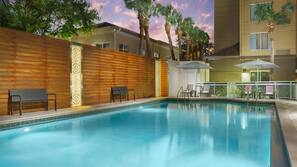 Outdoor pool, open 6:00 AM to 11:00 PM, pool umbrellas, sun loungers