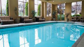 Indoor pool, seasonal outdoor pool, open 8 AM to 10 PM, pool umbrellas