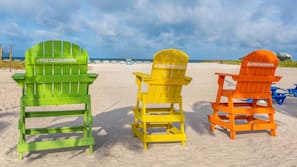 On the beach, beach cabanas, sun-loungers, beach umbrellas