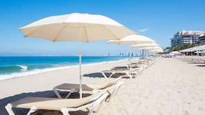 On the beach, beach umbrellas, beach towels