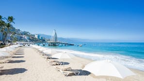 On the beach, beach umbrellas, beach towels