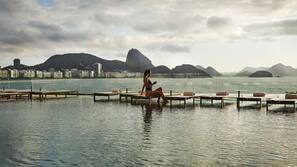 2 outdoor pools, pool umbrellas, sun loungers