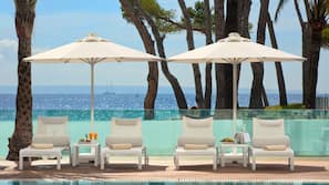 Indoor pool, 2 outdoor pools, pool cabanas (surcharge), pool umbrellas