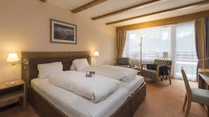 Hypo-allergenic bedding, free minibar, in-room safe, desk