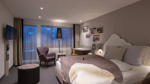 Hypo-allergenic bedding, free minibar, in-room safe, desk