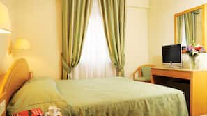 Ropa de cama hipoalergénica, minibar, caja fuerte