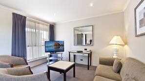 26-inch flat-screen TV with cable channels, TV