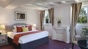Premium bedding, pillow-top beds, minibar, in-room safe