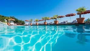 Indoor pool, outdoor pool, pool umbrellas, sun loungers