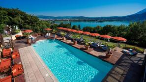 Indoor pool, outdoor pool, pool umbrellas, sun loungers