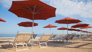 On the beach, beach massages, beach bar