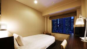 Premium bedding, down duvet, in-room safe, desk