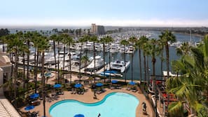 3 outdoor pools, open 7:00 AM to 10:00 PM, pool umbrellas, pool loungers