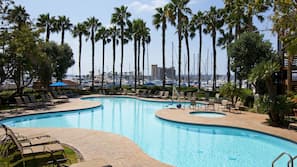 3 outdoor pools, open 7:00 AM to 10:00 PM, pool umbrellas, pool loungers