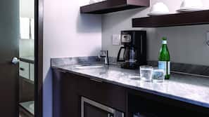 Mini-fridge, microwave, coffee/tea maker, cookware/dishes/utensils