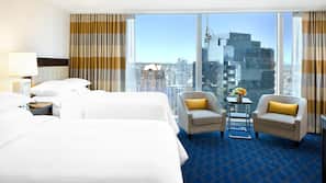 Premium bedding, down comforters, pillowtop beds, in-room safe