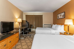 Premium bedding, pillowtop beds, desk, laptop workspace