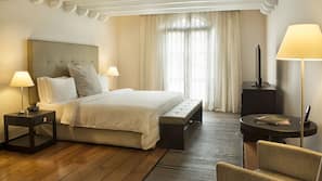 Ropa de cama de alta calidad, minibar, caja fuerte y escritorio