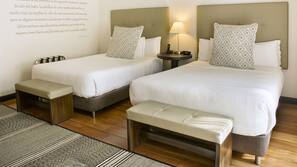 Ropa de cama de alta calidad, minibar, caja fuerte y escritorio