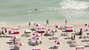 On the beach, beach cabanas, sun-loungers, beach umbrellas