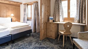 Premium bedding, down comforters, minibar, in-room safe
