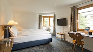 Premium bedding, down comforters, minibar, in-room safe