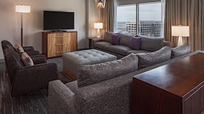 Flat-screen TV, iPod dock, pay movies