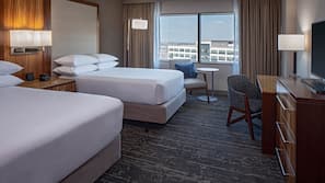 Premium bedding, down comforters, pillowtop beds, in-room safe