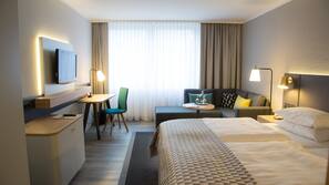 Hypoallergeen beddengoed, een minibar, een kluis op de kamer, een bureau
