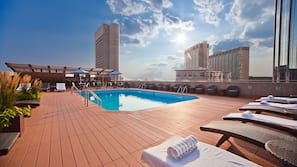 Seasonal outdoor pool, cabanas (surcharge), pool umbrellas