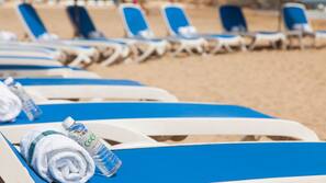 Beach nearby, white sand, beach umbrellas