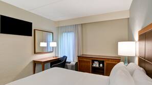 Premium bedding, laptop workspace, blackout drapes, iron/ironing board