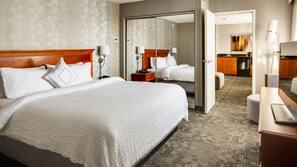 Hypo-allergenic bedding, desk, iron/ironing board, rollaway beds