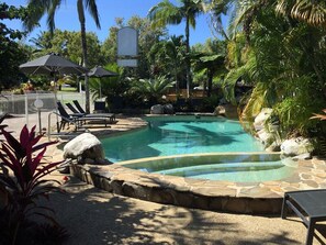 Outdoor pool, pool umbrellas, sun loungers