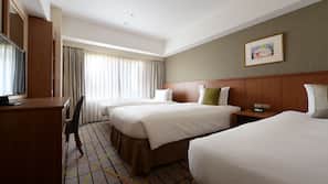 Down comforters, desk, blackout drapes, iron/ironing board