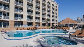 Outdoor pool, open 7:00 AM to 10:00 PM, pool umbrellas, sun loungers