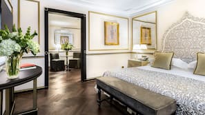 Ropa de cama de alta calidad, minibar, caja fuerte y escritorio