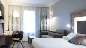 Luxe beddengoed, een minibar, een kluis op de kamer, een bureau