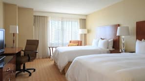 Hypo-allergenic bedding, down duvet, pillow top beds, in-room safe