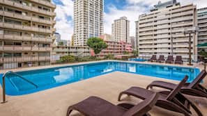 Outdoor pool, open 7:00 AM to 9:00 PM, sun loungers