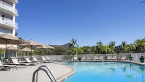 Outdoor pool, pool umbrellas, sun loungers