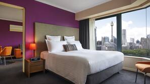 Premium bedding, down comforters, pillowtop beds, minibar