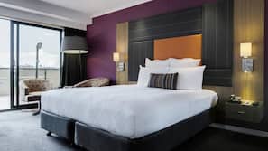 Premium bedding, down comforters, pillowtop beds, minibar