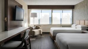 Premium bedding, down comforters, pillowtop beds, in-room safe