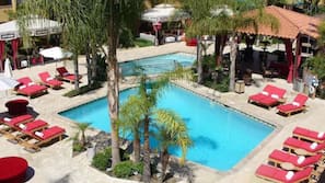 Outdoor pool, free cabanas, pool umbrellas