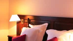 Ropa de cama hipoalergénica, minibar, caja fuerte