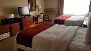 Desk, blackout drapes, iron/ironing board, free cribs/infant beds